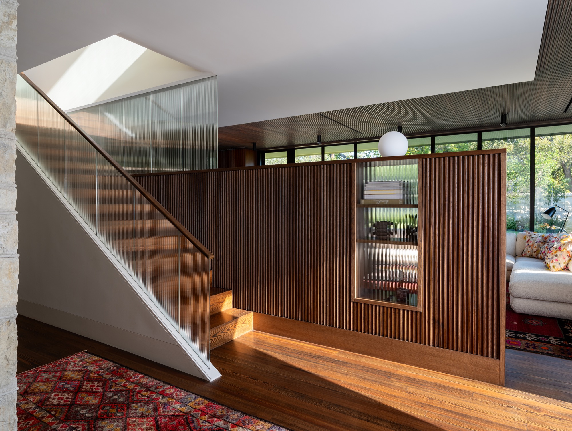 Victorian House stair with fluted wood and ribbed glass in Austin, Texas